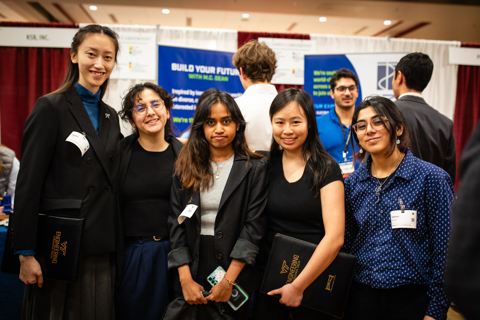 Fiver students at a trade show.