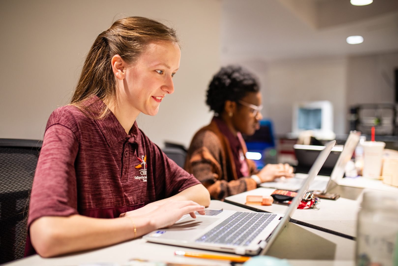 Students on laptops.