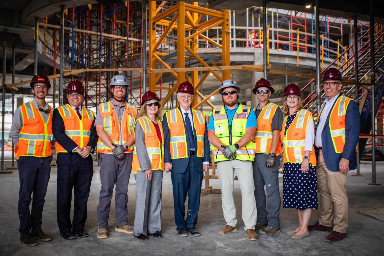 The Mitchells touring the construction site - image 3